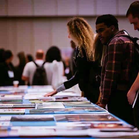 Booklets at a convention, written by ghostwriters or copywriters.